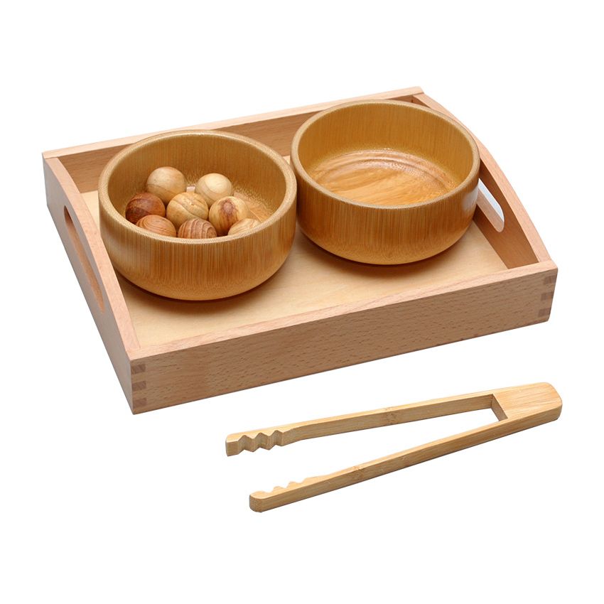 Transfer Of Camphor-Wood Balls Using Tongs