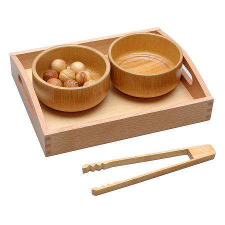 Transfer Of Camphor-Wood Balls Using Tongs